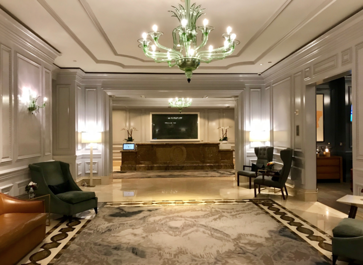 a chandelier in a hotel lobby