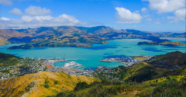 a landscape of a city and water