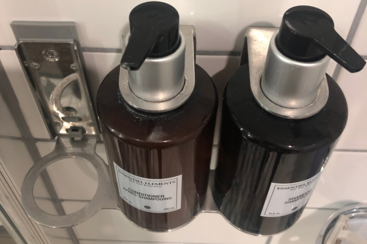 a couple of brown bottles with black labels