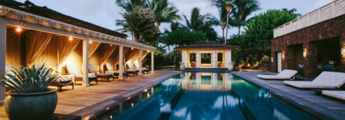 a swimming pool with a gazebo and a gazebo