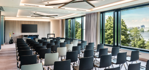 a room with many chairs and a podium