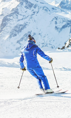 a person skiing on the snow