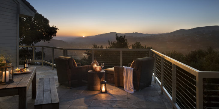 chairs and a table on a deck