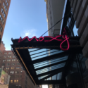 a neon sign on a building