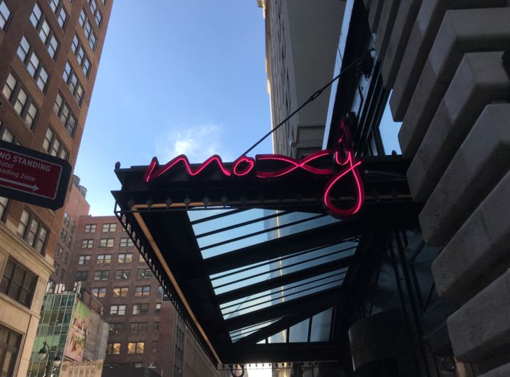 a neon sign on a building