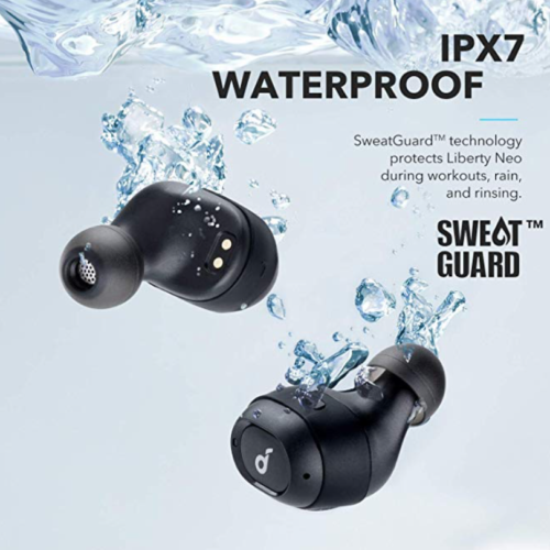 a pair of earbuds in water