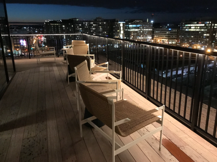 a group of chairs on a deck