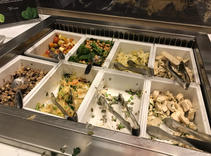 a trays of food in a buffet