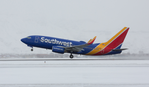 a plane taking off from a runway