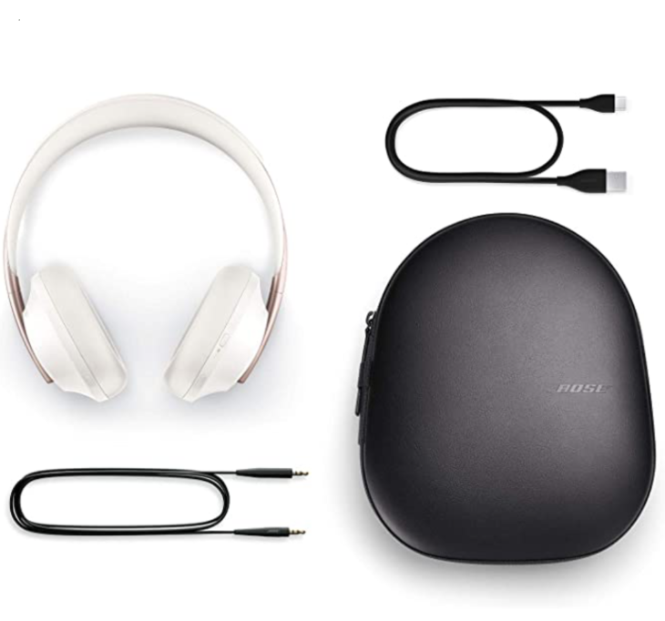 a white headphones and a black case