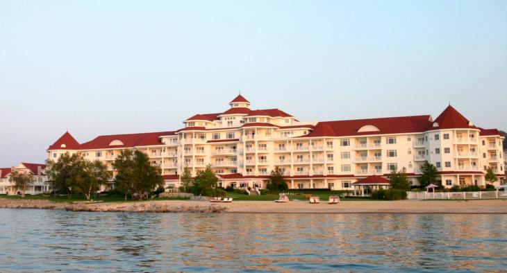 a large white building with red roofs