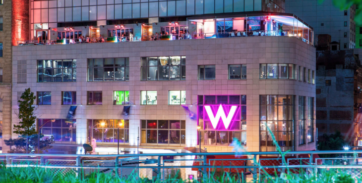 a building with a lit up sign