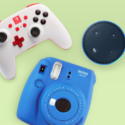 a blue and white video game controller next to a blue and white camera