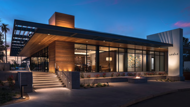 a building with a staircase and a fire pit