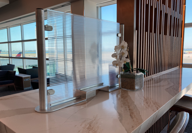 a glass screen on a counter