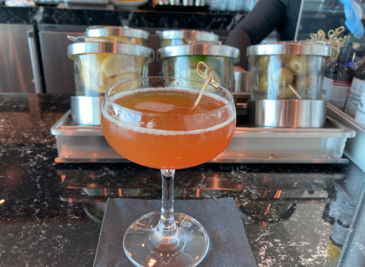 a glass of orange liquid