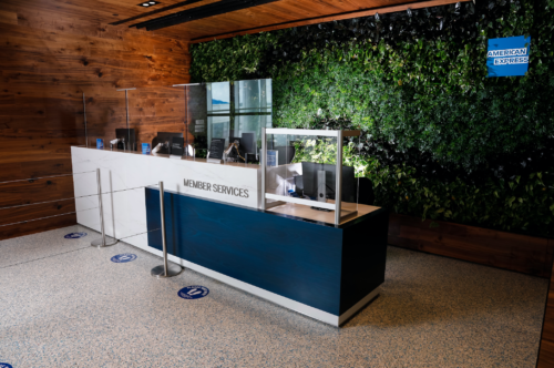 a reception desk with glass cases