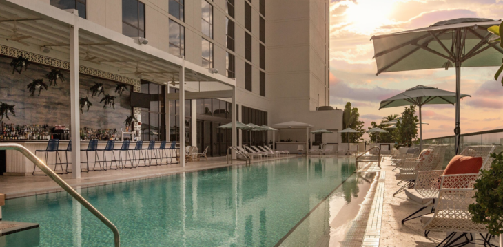 a swimming pool next to a building