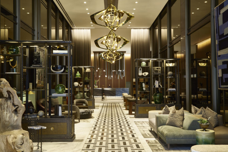 a lobby with a large chandelier