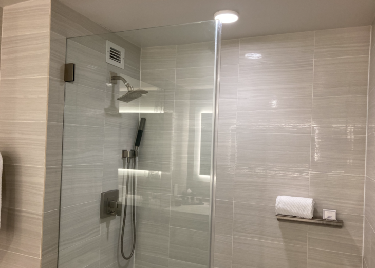 a shower with a glass door