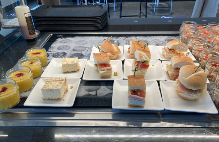 a group of small sandwiches on small plates