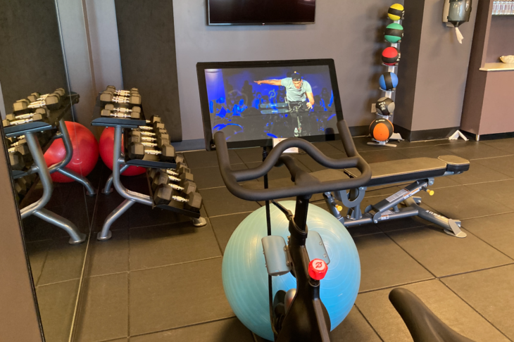 a exercise bike and exercise equipment in a room