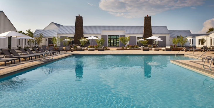 a swimming pool with a building and a building