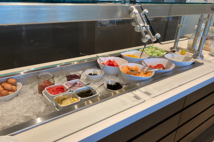 a buffet line with different kinds of food