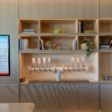 a room with shelves and a beer tap