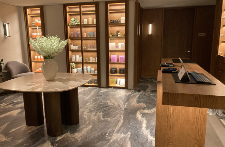 a room with shelves of cosmetics