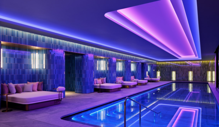 a pool with purple lights