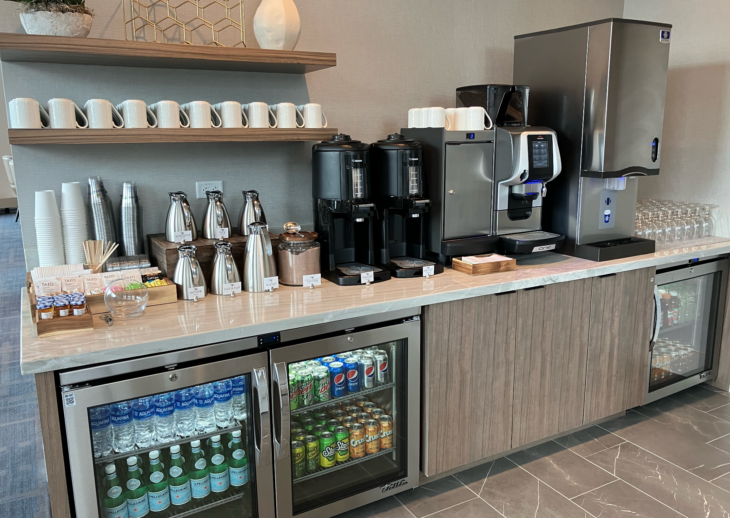 a coffee machine and beverage coolers