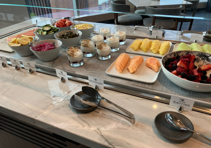 a buffet table with different food items on it