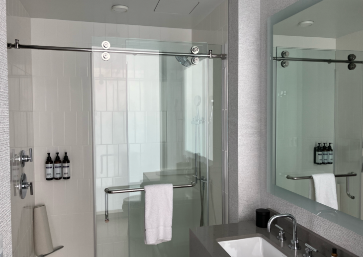 a bathroom with a glass door