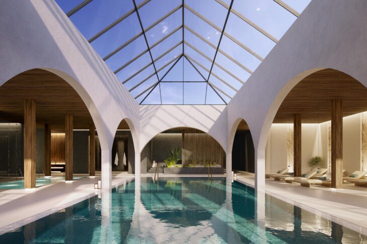 a indoor pool with a glass roof